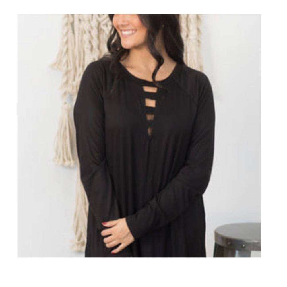 Cute cut out neckline. Black. Never worn